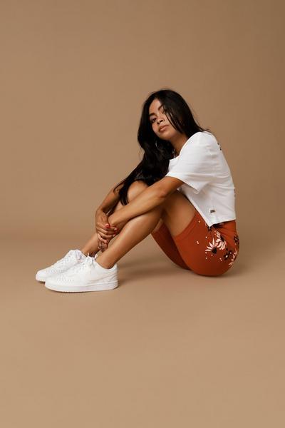 Woman in Nike apparel and Air Force 1